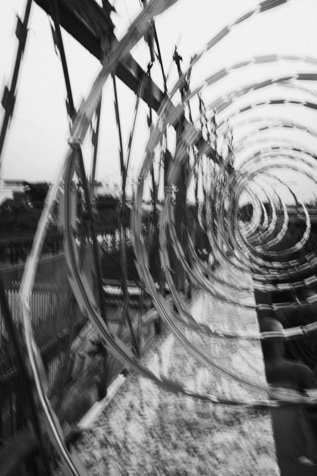 Change Reality With Your Mind: Step Into a New Timeline Black-and-white spiral tunnel with motion blur, suggesting a shift in perception and changing reality with your mind.