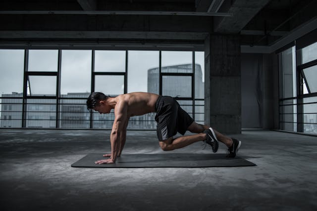 Man exercising in a gym to boost focus and energy for finding his purpose and passion