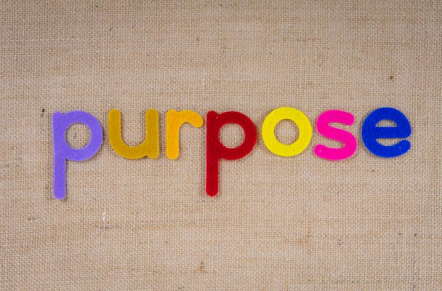 The word purpose written in colorful letters symbolizing joy and clarity