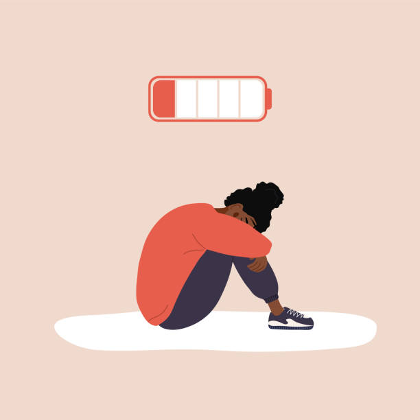 Illustration of a tired woman sitting curled up under a low battery icon, symbolizing emotional exhaustion before practicing abundance mindset affirmations.