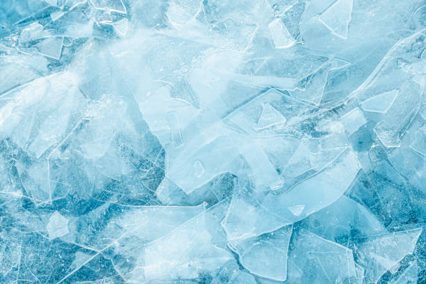Close-up of jagged blue ice shards and frosty textures.