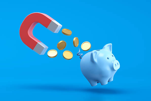 Red magnet attracting gold coins toward a blue piggy bank, representing powerful money affirmations that work like a magnet for wealth.