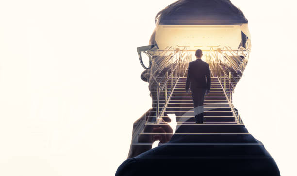 Double exposure of a thoughtful man with a staircase leading to light, showing next steps for what to do when you don’t have any money.
